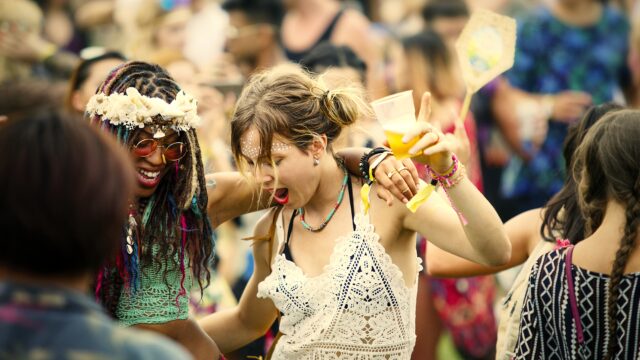 Diverse group of people enjoying a road trip and festival