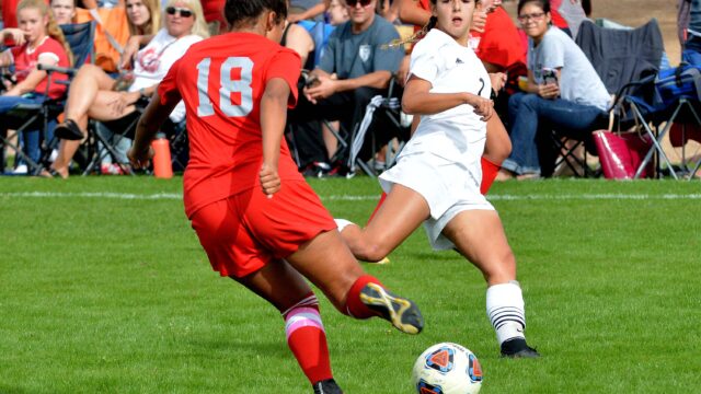 people-playing-soccer-field