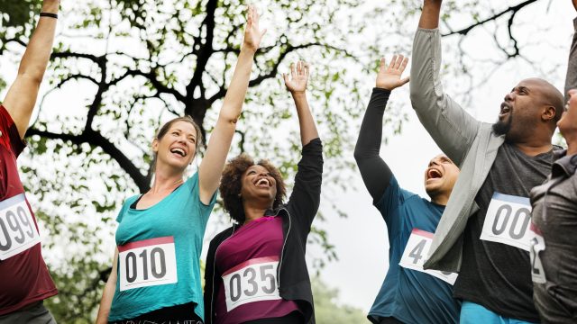 Team of diverse people ready for a race