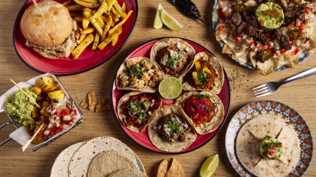 Traditional Mexican tacos with minced meat and sauce.Top view